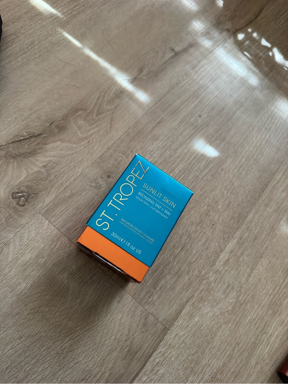 St. Tropez Sunlit Skin Bronzing Tint + Tan - Picture 2 of 3